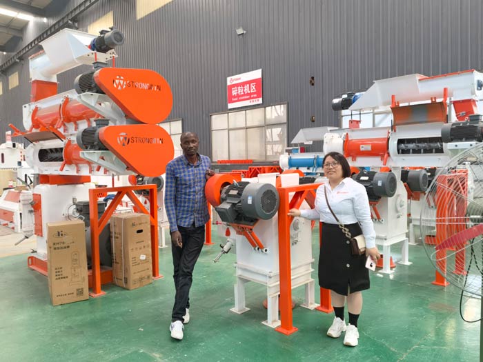 Rwandan customer visits our feed pellet machine factory